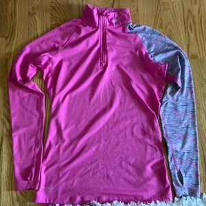 NIKE Combat DriFit pullover in Magenta pink with detailed sleeve